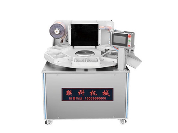 旋轉(zhuǎn)式貼體包裝機